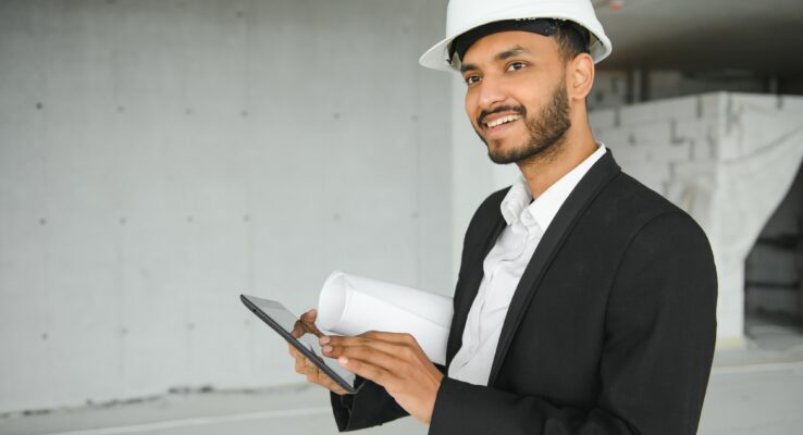 How Al Musahim Investment Provides Reliable Maintenance Services in Abu Dhabi 1 Confident asian engineer man Using tablet for checking and maintenance to inspection