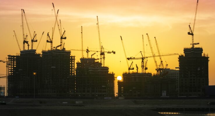 Green Building Practices in Abu Dhabi: Al Musahim Investment’s Approach 1 Construction Cranes in Dubai