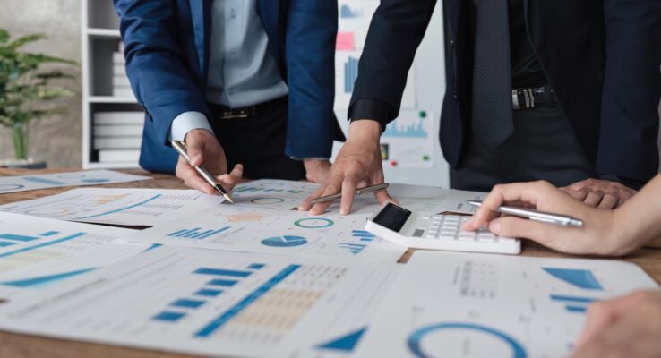 Timely Project Delivery: How We Meet Deadlines Without Compromising Quality 1 Female seller write the customer's address on the parcel box to prepare for delivery and using