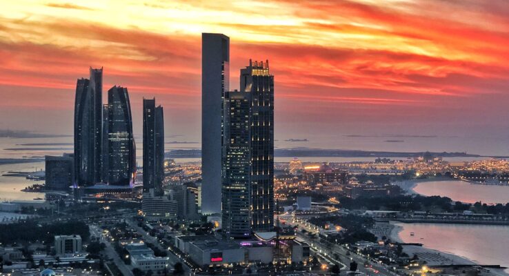 Sun Sets on Abu Dhabi Desert City By The Sea